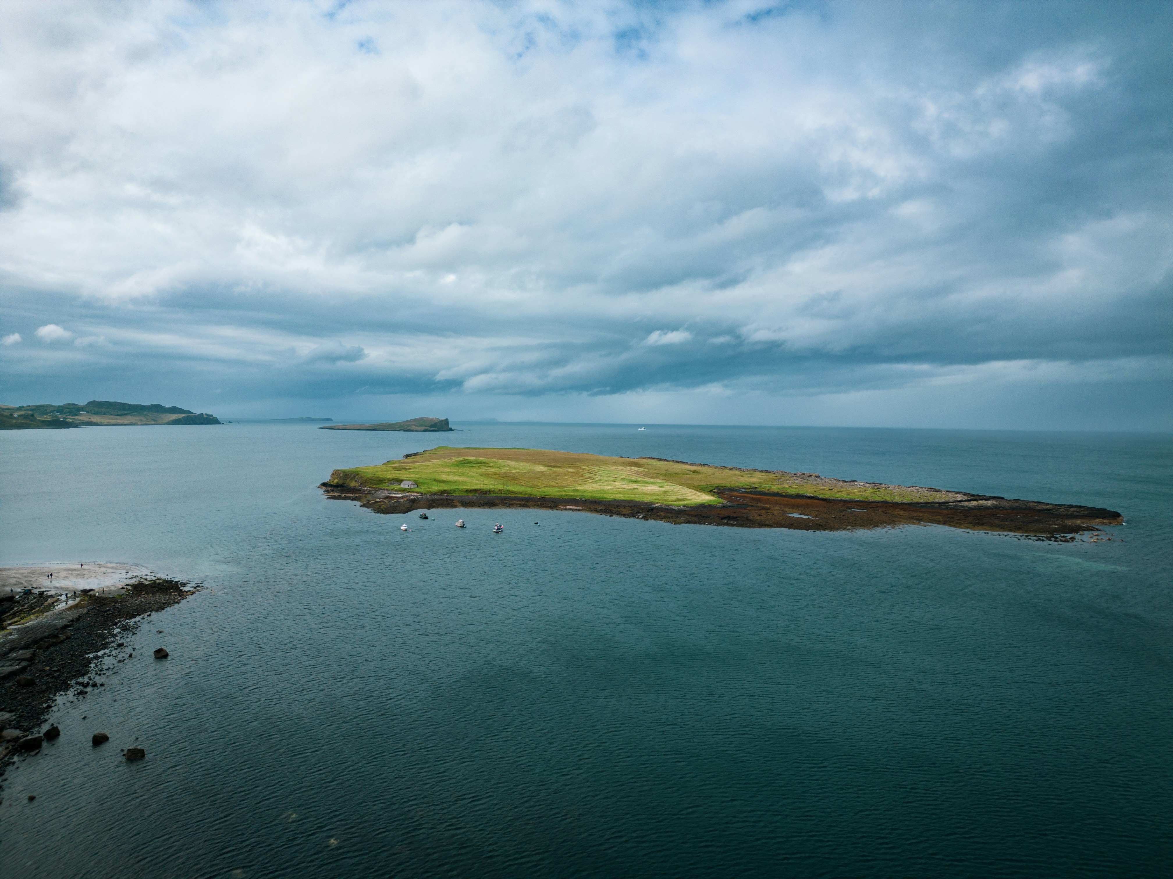 an island in the middle of a body of water, Staffin Island, Isle of Skye