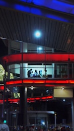 Futuristic flat design of a tech team installing smart systems in a modern building.