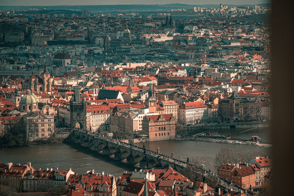 a view of a city and a bridge over a river