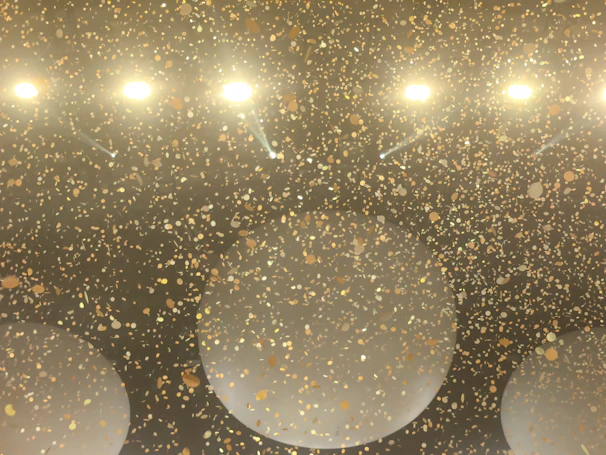 A festive scene with confetti and a big 'Bonus' sign glowing on the screen.