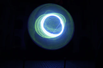 A smooth animation concept showing gears turning in sync with glowing green light.