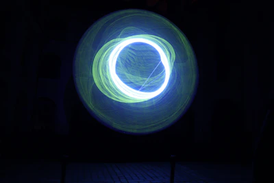 A smooth animation concept showing gears turning in sync with glowing green light.