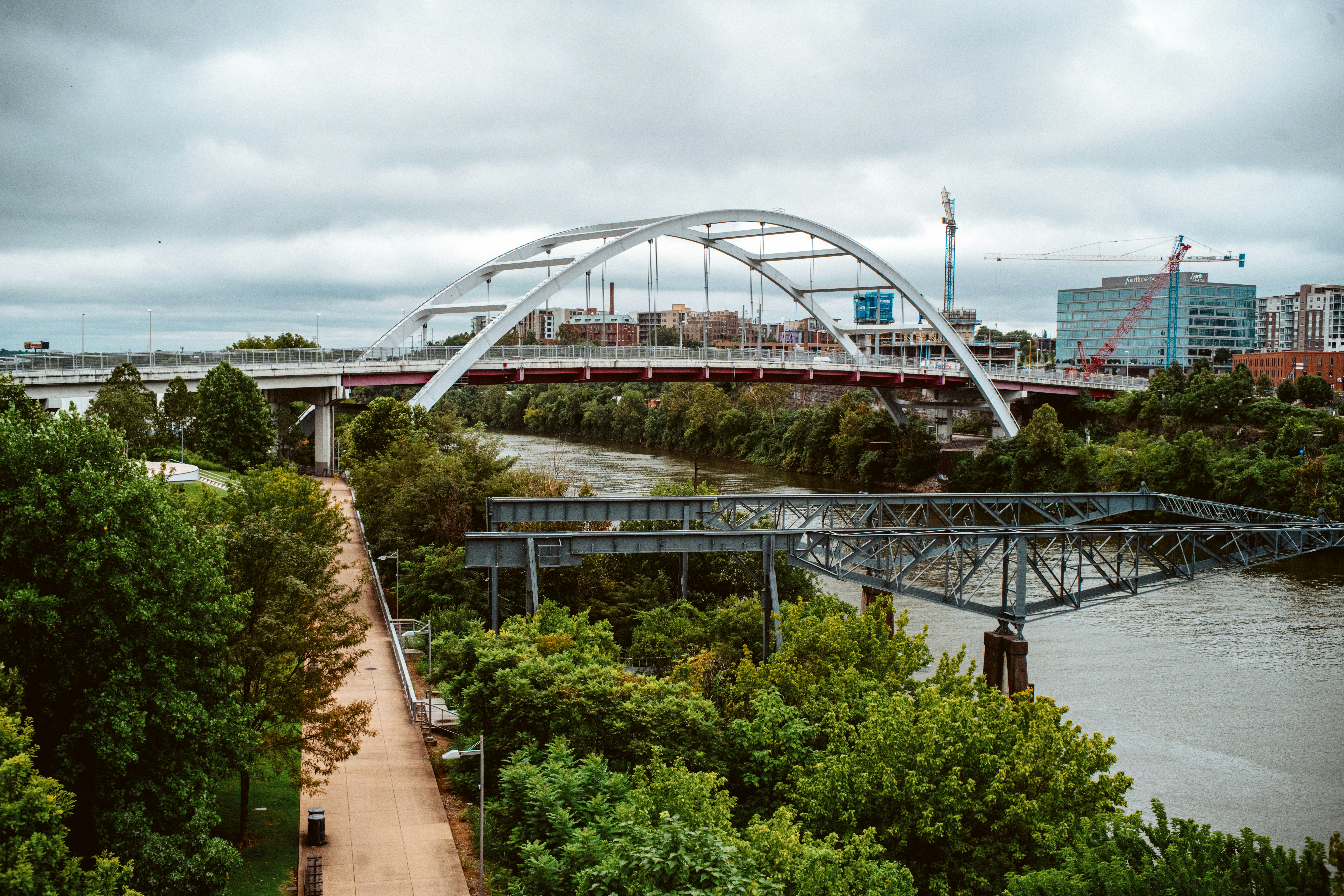 a bridge over a river in a city