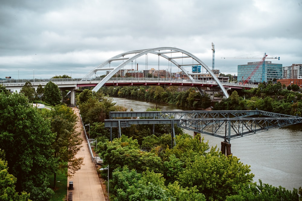 a bridge over a river in a city