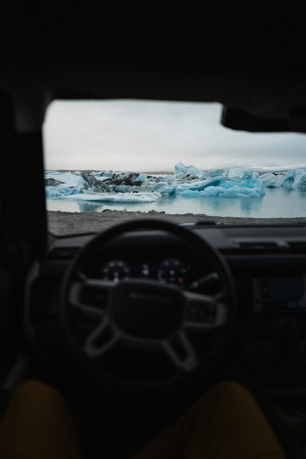 a view of a glacier from inside a car