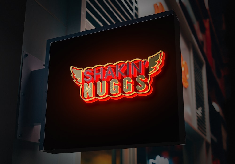 a neon sign with the words sparkin'juggs on it
