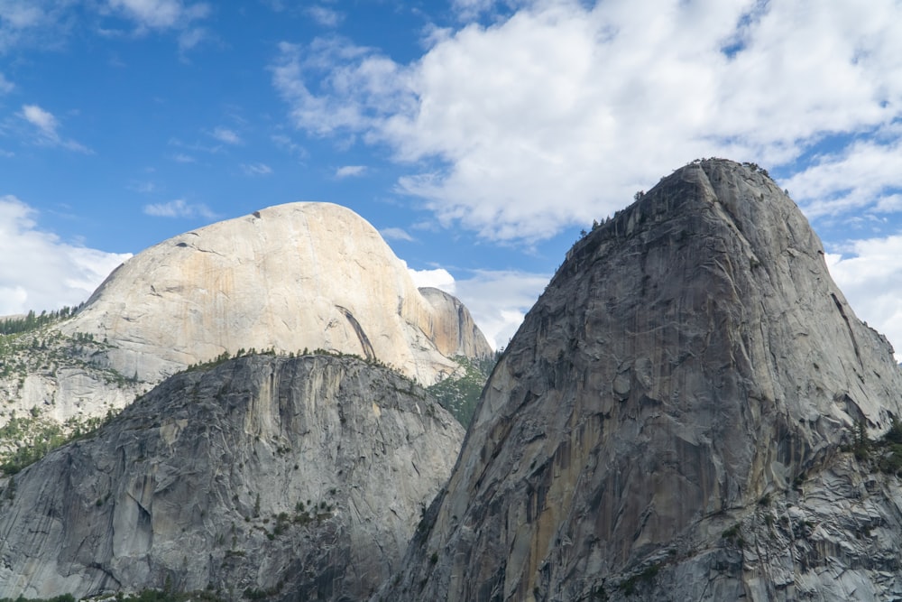 a view of a mountain with a sky background