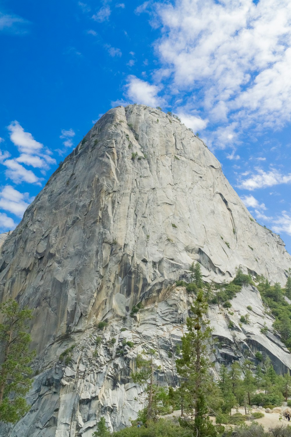 a very tall mountain with a sky background