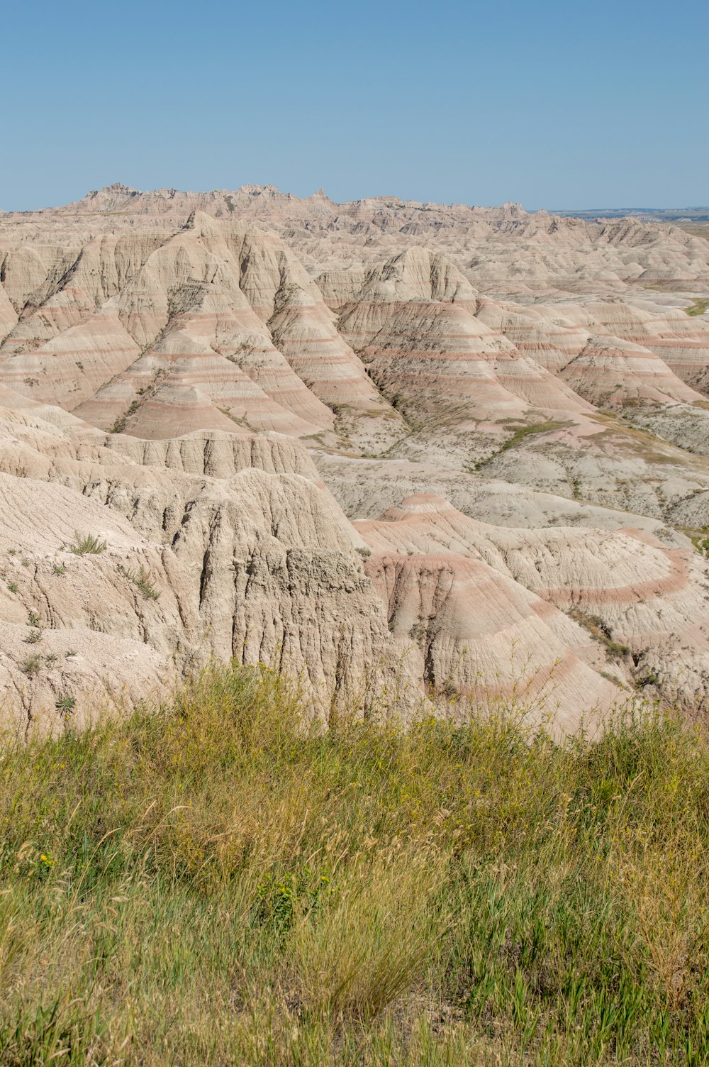 a view of the badlands from the top of a hill