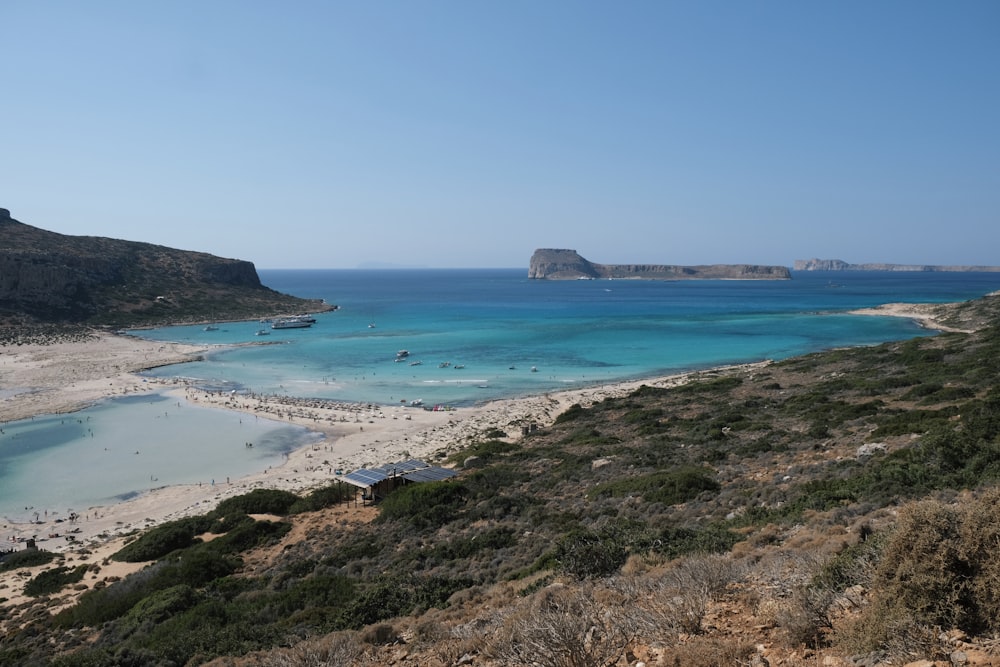 a view of a beach from a hill