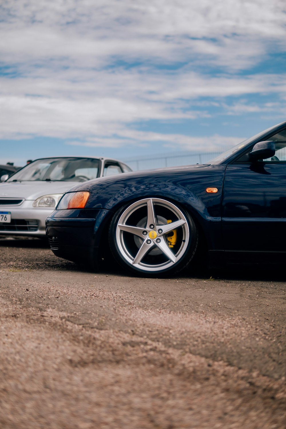 a couple of cars parked next to each other