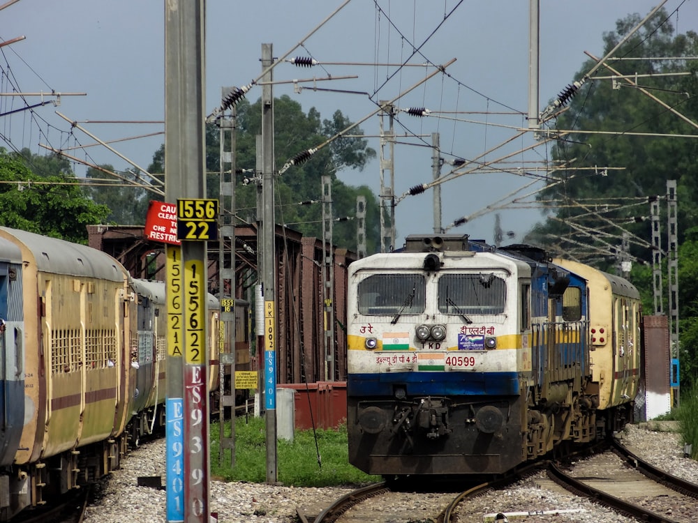 a couple of trains that are sitting on the tracks