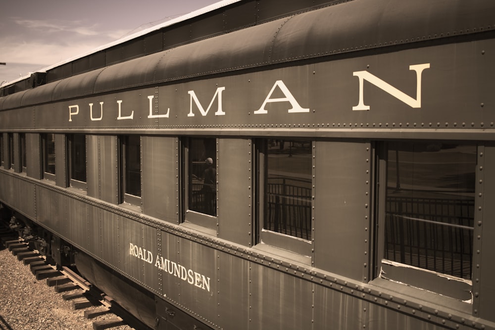a black and white photo of a pullman train