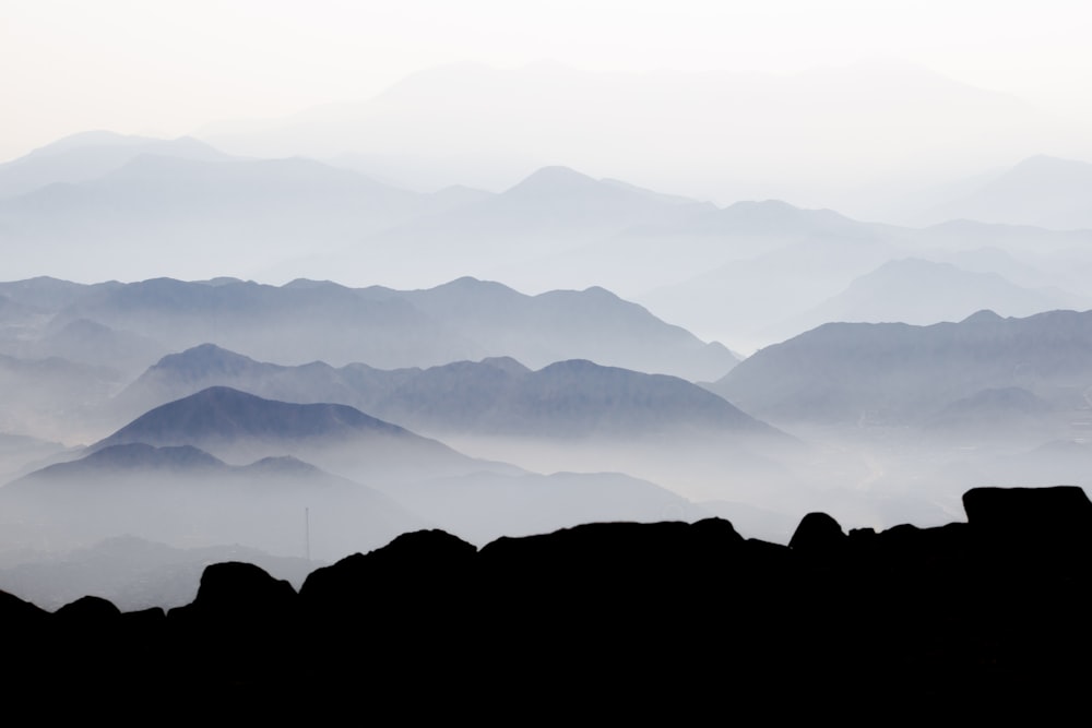 a person standing on top of a mountain