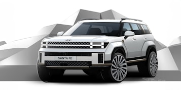 A modern SUV with a sleek design, featuring a boxy structure and large wheels. The vehicle is white and shown against a minimalist background with geometric shapes.