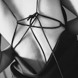 Close-up of the wearable’s soft, breathable fabric hugging the upper back naturally.