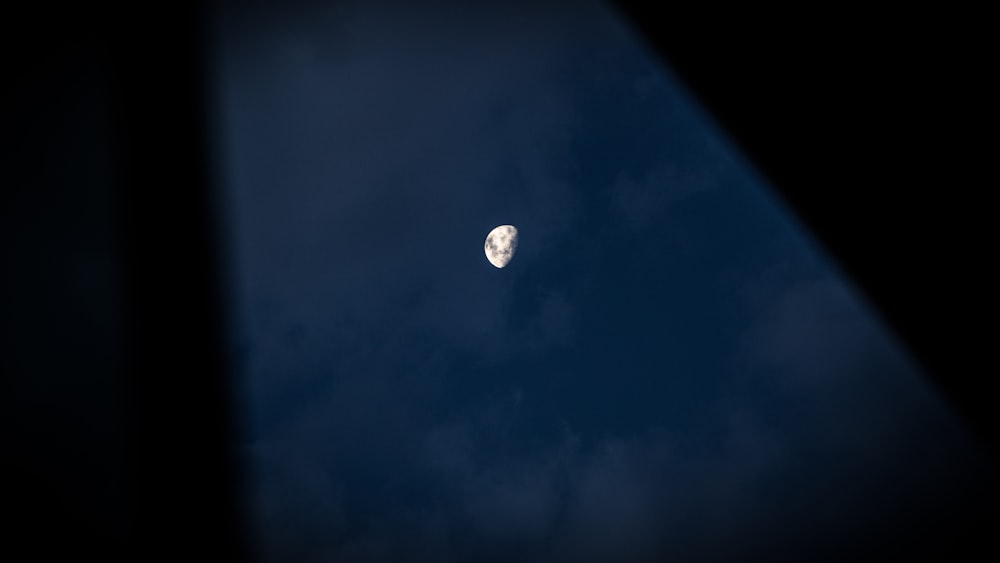 a view of the moon through a window