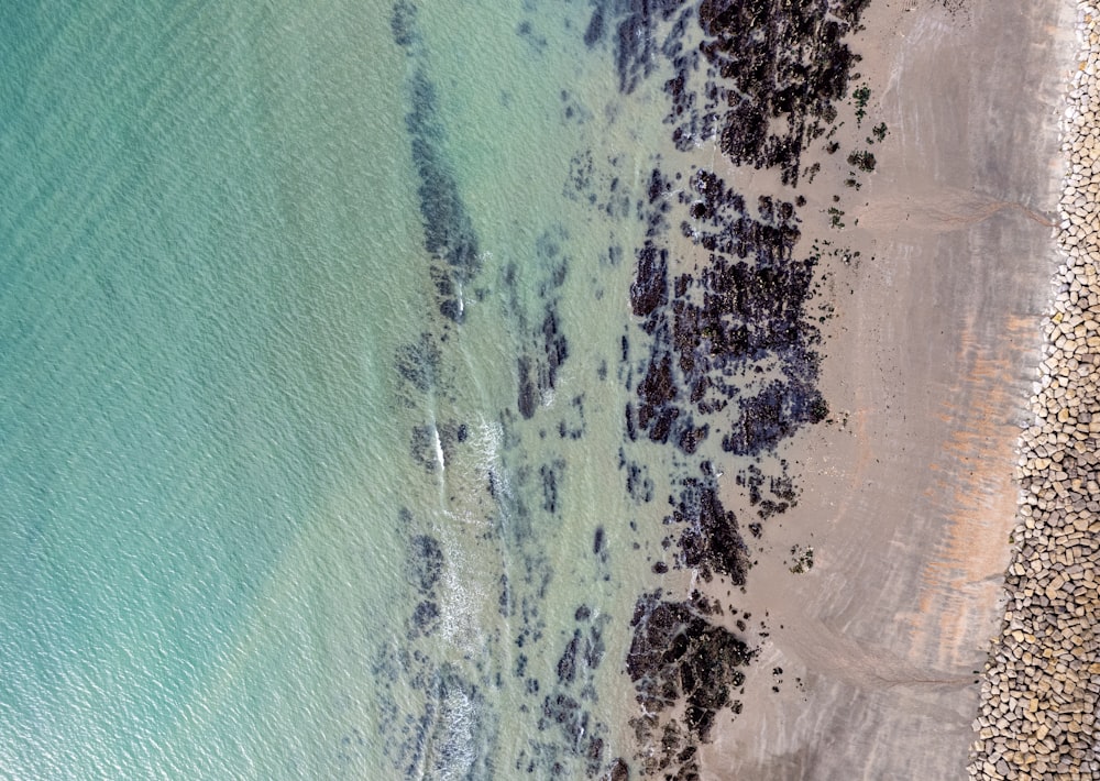 a bird's eye view of a beach and ocean