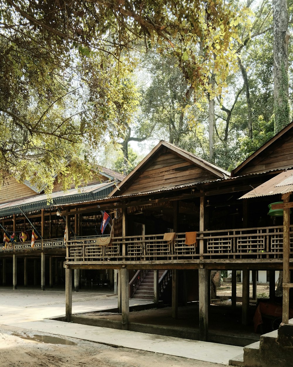 a row of wooden buildings sitting next to each other