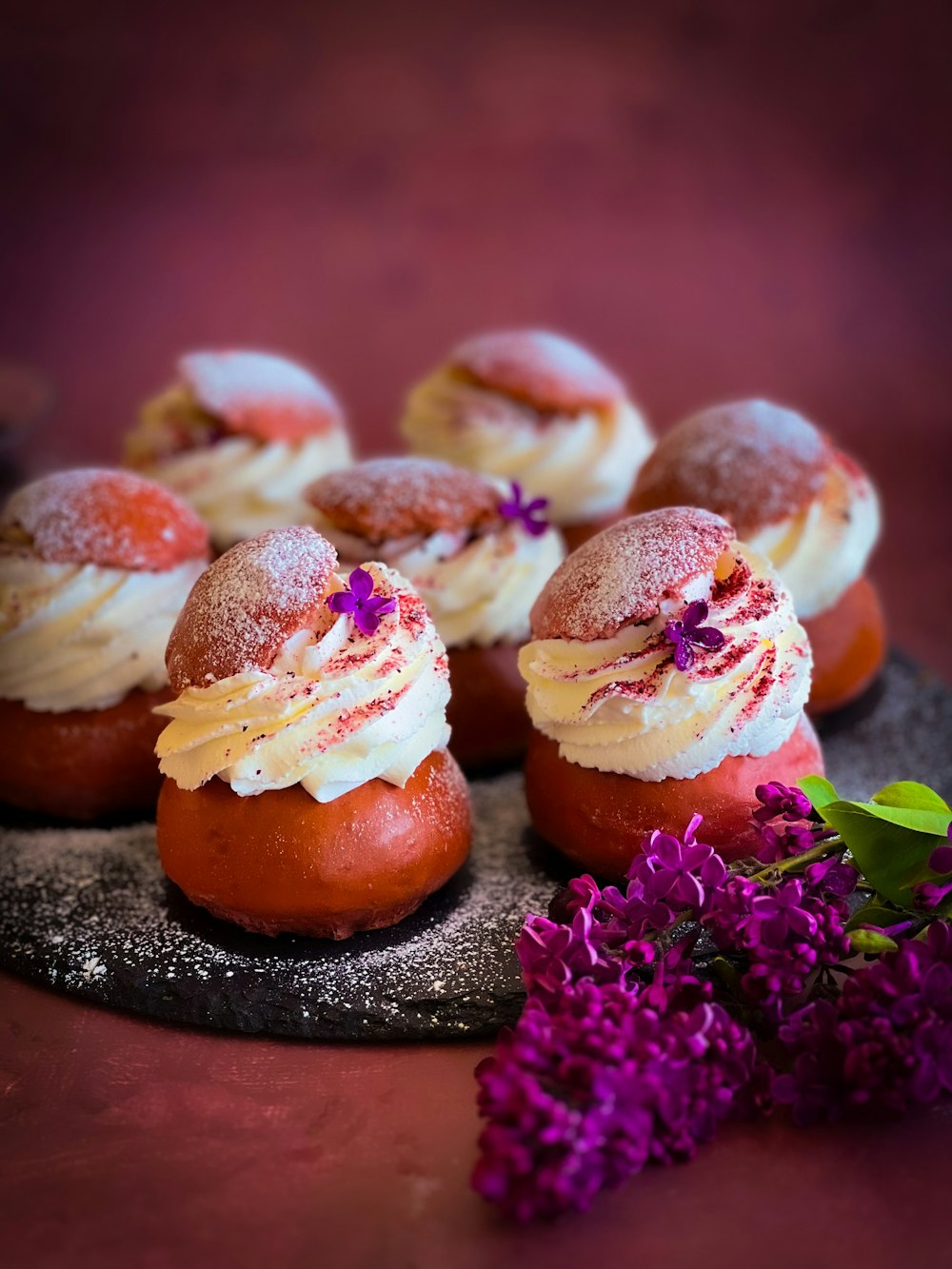 a close up of a plate of food with flowers