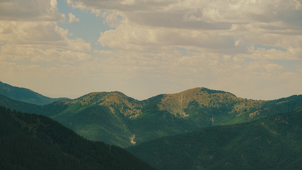 a view of a mountain range from a distance