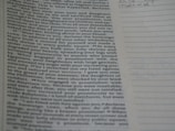 The image contains a close-up view of a printed book page with text primarily on the left side. The right side of the image has lined paper that appears to be a space for notes. The text includes religious and somber themes, visible in phrases like 'Sovereign LORD' and descriptions of practices and behaviors.