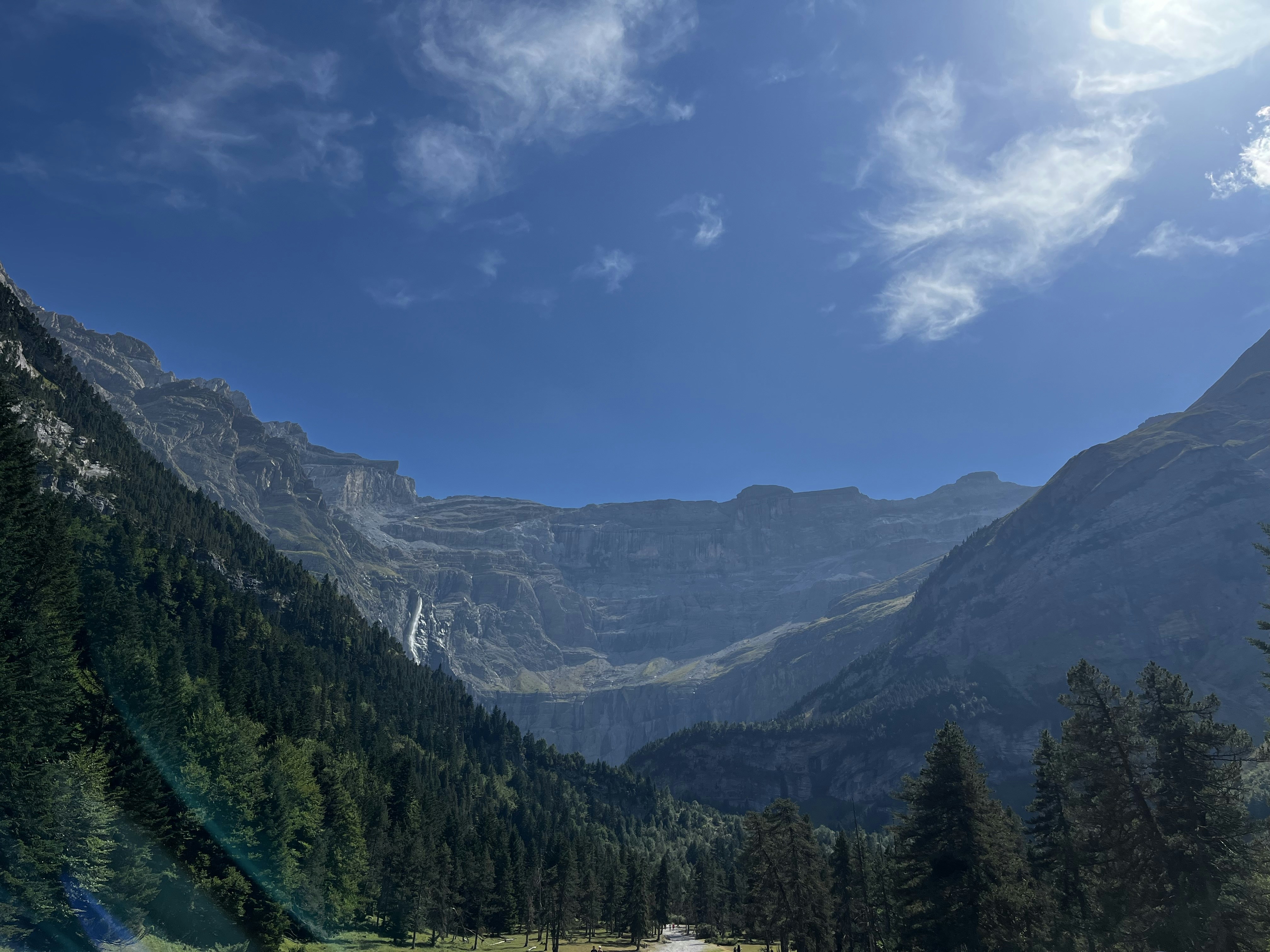 a dirt road in the middle of a mountain range