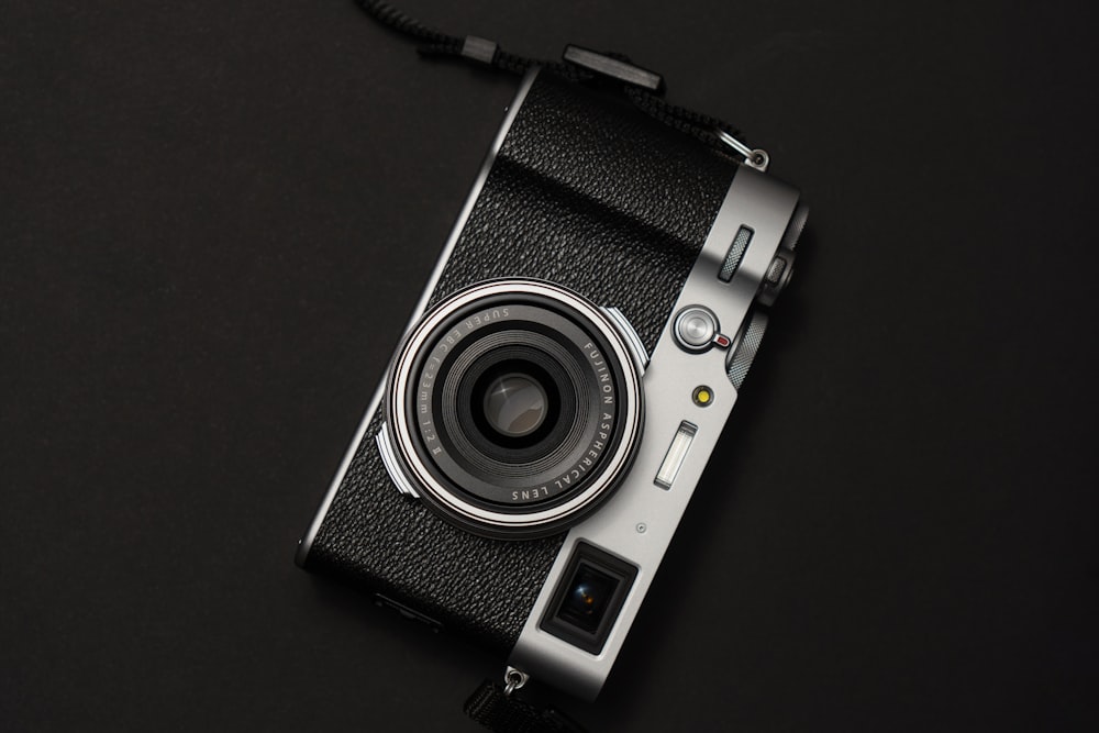 a camera sitting on top of a black table