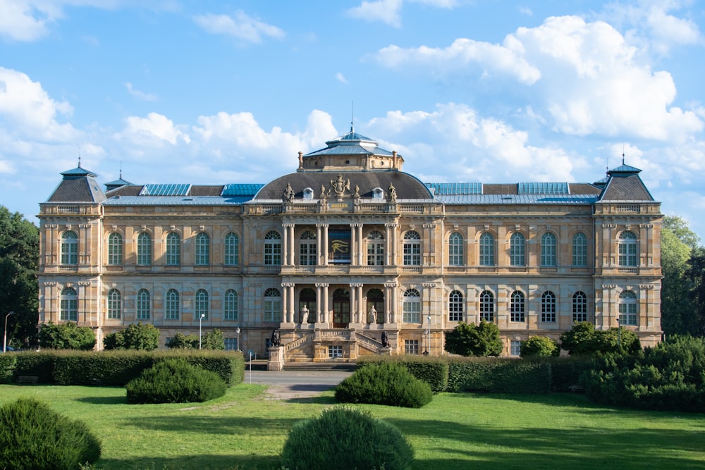 a large building with a lot of windows on top of it