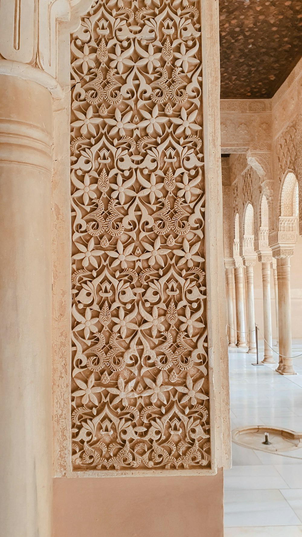 an intricately carved wall in a building