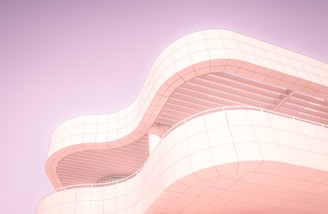 A stunning photograph of a modern architectural project set in soft pastel shades.