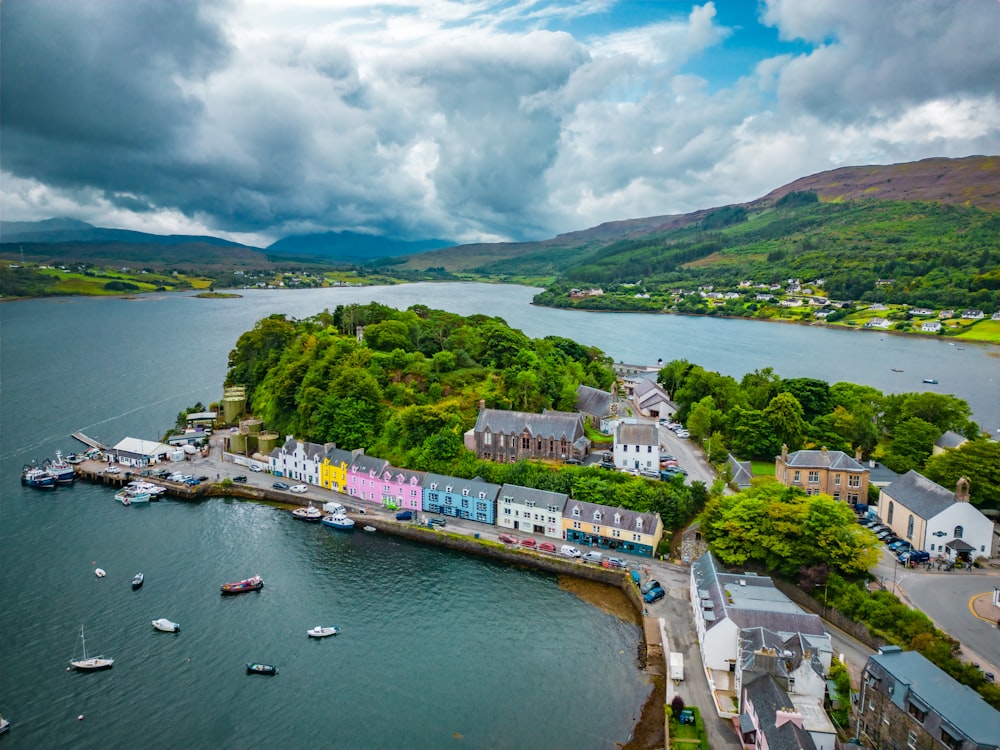 an aerial view of a small town by the water