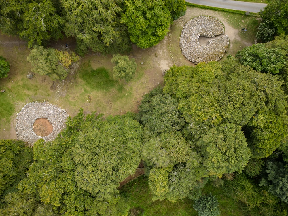 an aerial view of a wooded area with trees