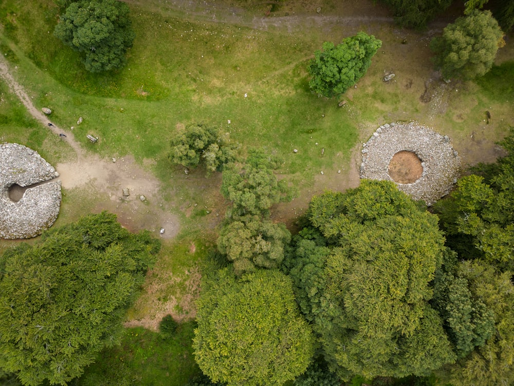 an aerial view of a wooded area with trees