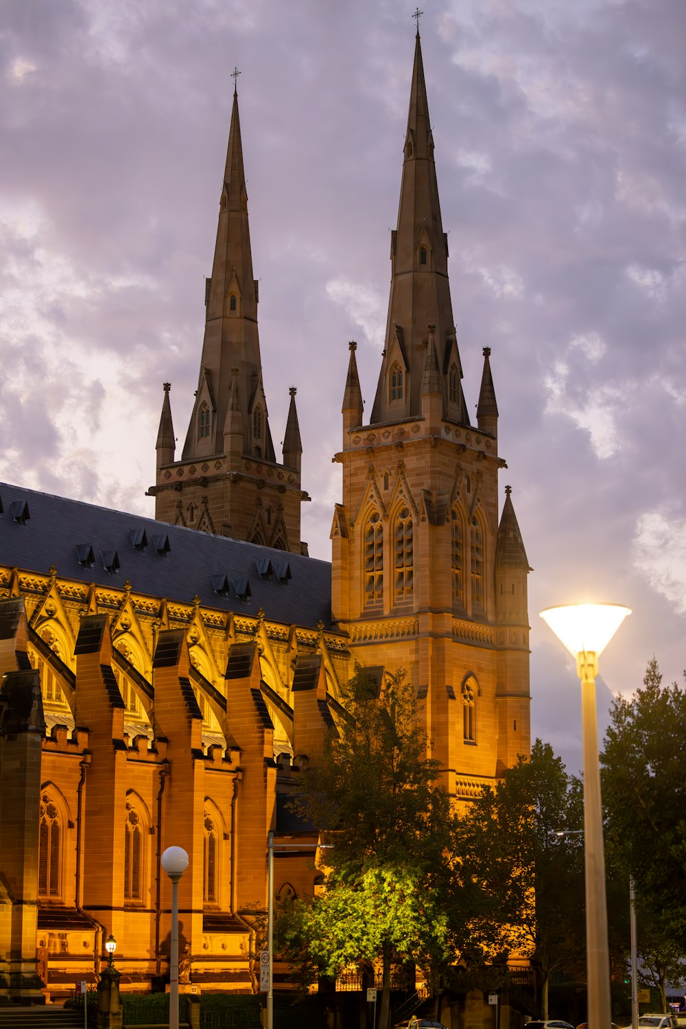 a large cathedral with a clock on the front of it