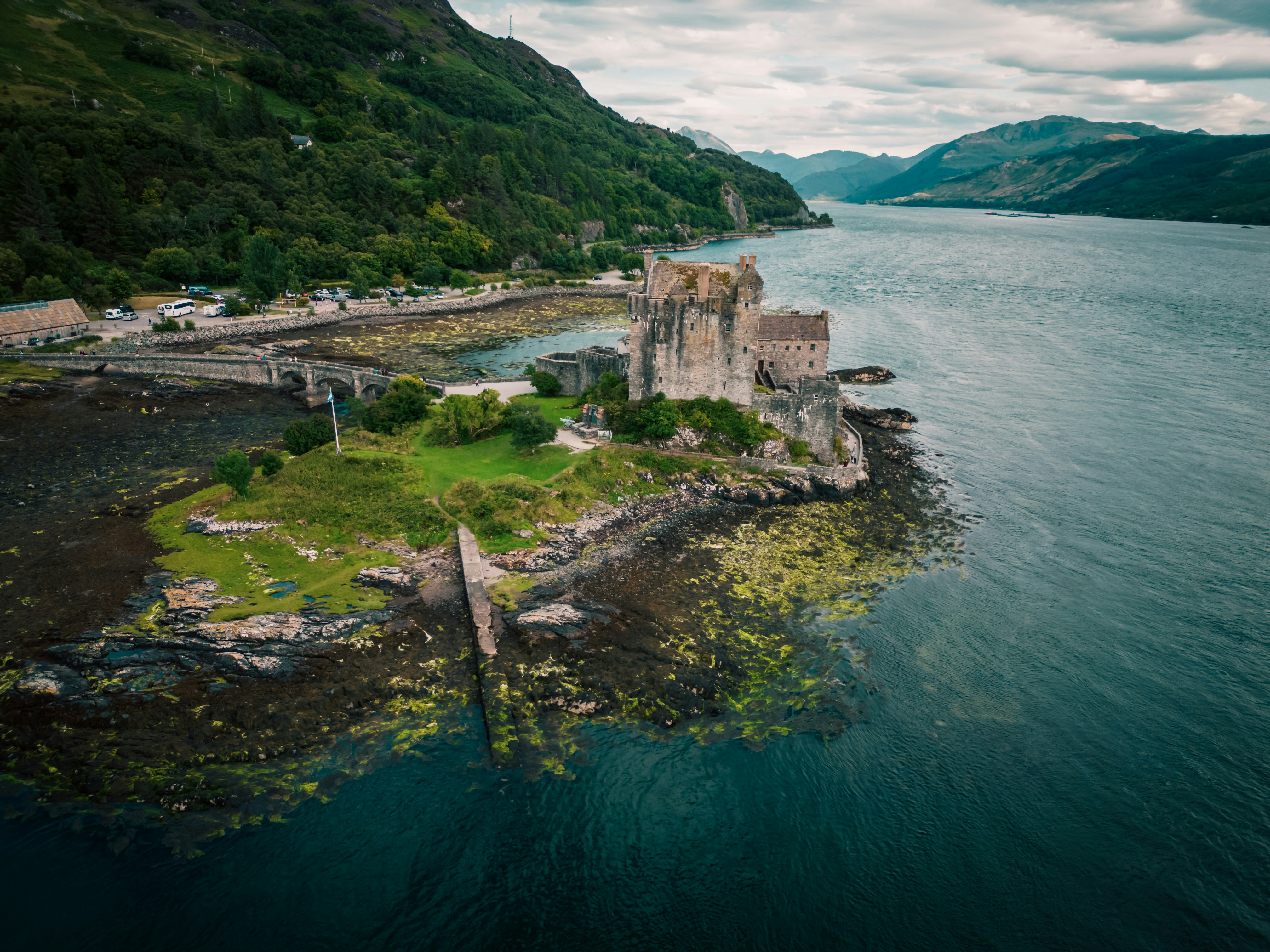 an island in the middle of a body of water, Eilean Donan Castle, Scotland