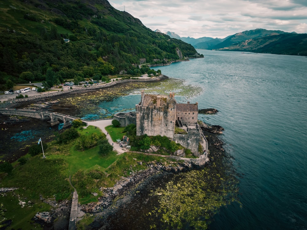 an aerial view of a castle on a small island