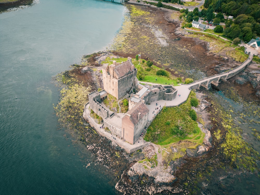 an aerial view of a castle on an island