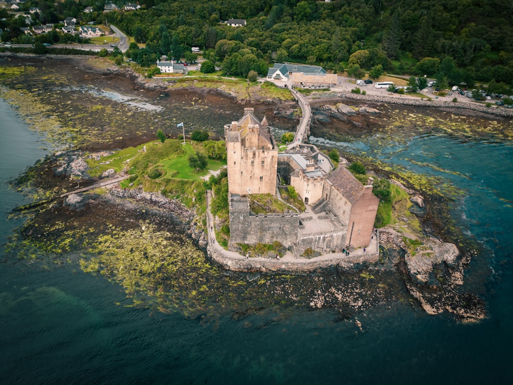 an aerial view of a castle on an island