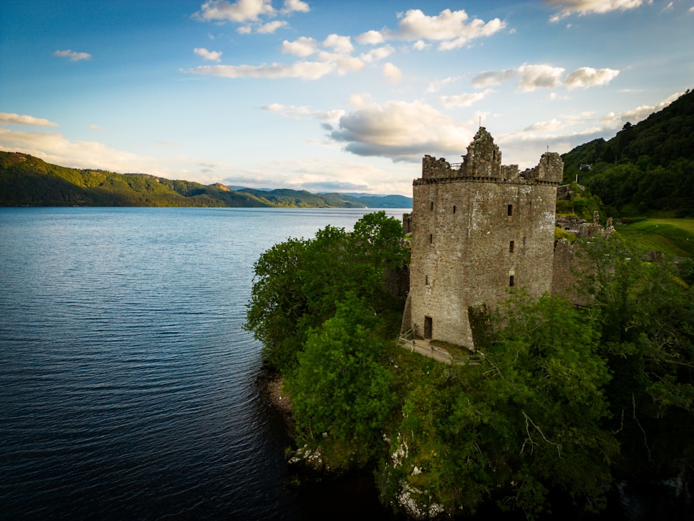 a castle on an island in the middle of a lake