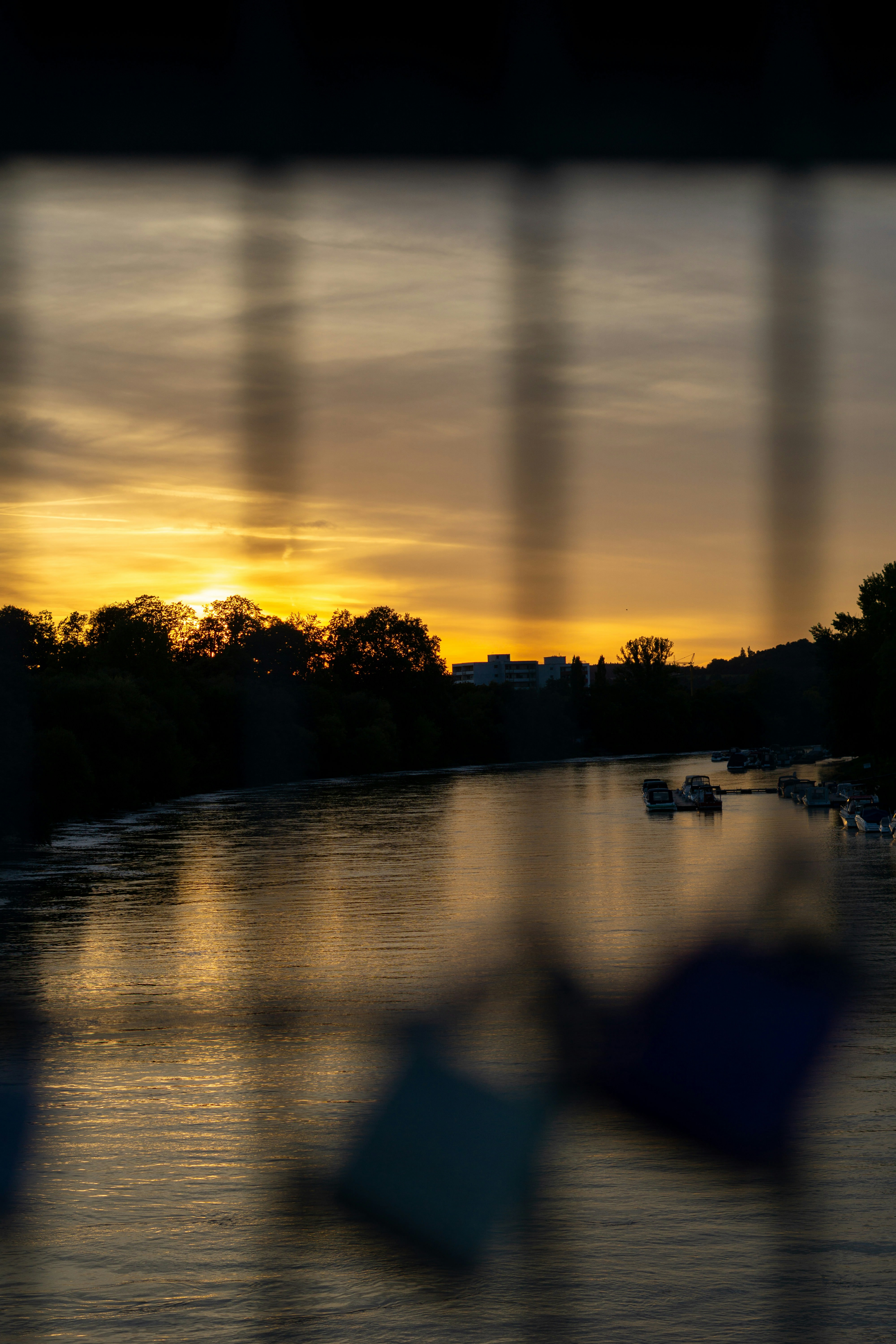 the sun is setting over a body of water