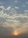 A serene sky with soft, glowing clouds at sunrise, symbolizing new beginnings.