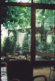 A peaceful outdoor space with comfortable seating and greenery.
