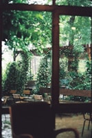 Outdoor seating area surrounded by greenery, perfect for relaxing after a busy day.