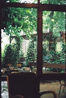 A peaceful outdoor space with comfortable seating and greenery.