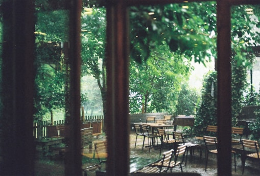 A serene garden in Marrakech showing a pest-free outdoor seating area bathed in soft morning light.