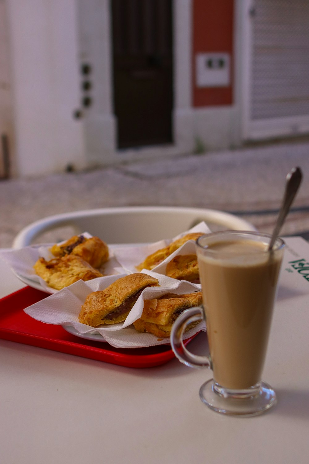 a plate of food and a drink on a table