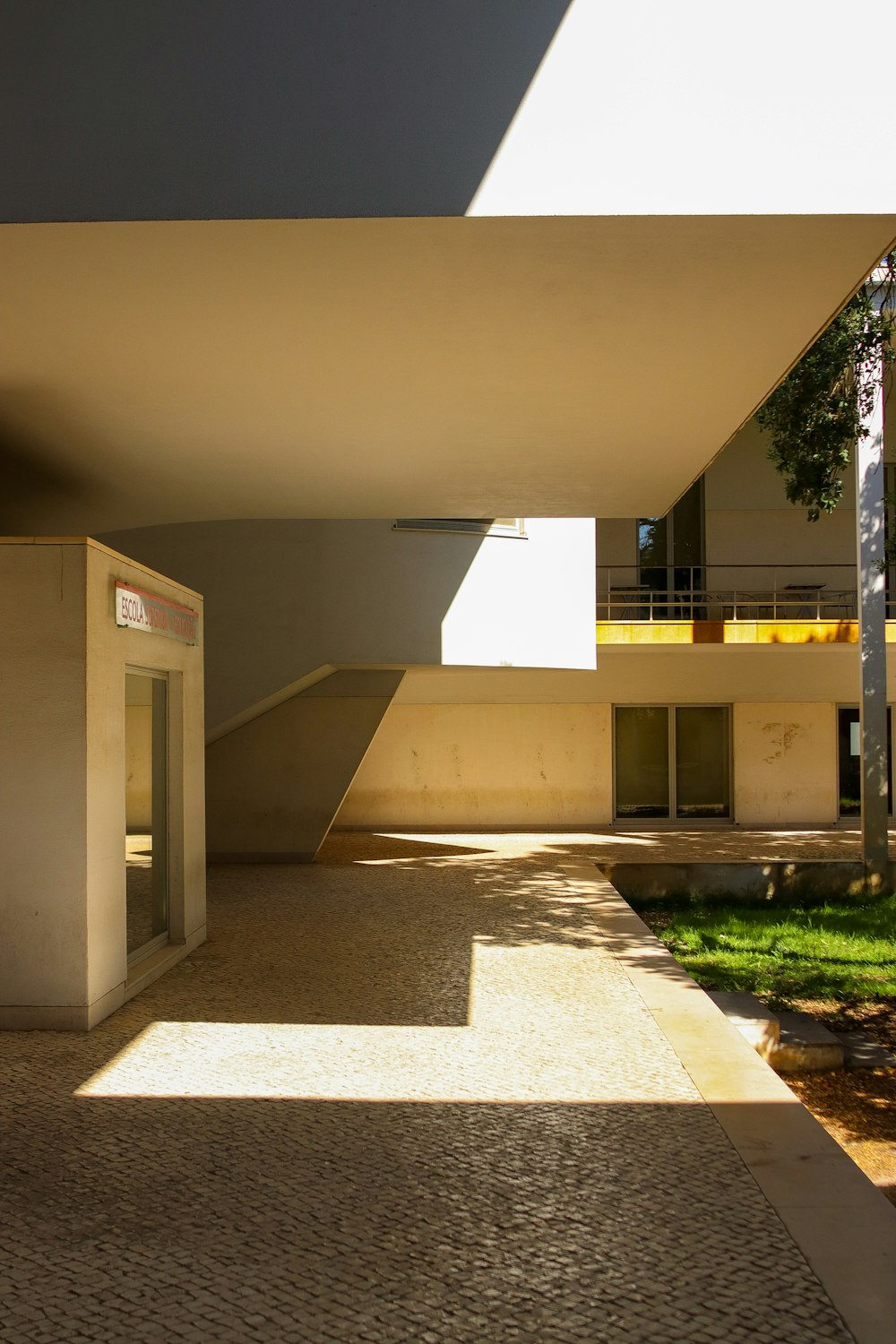 a building with a walkway between two buildings