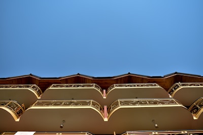 Exterior view of the Cielo Mar building with balconies overlooking the city.