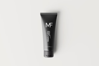 a tube of m f skin care on a white background